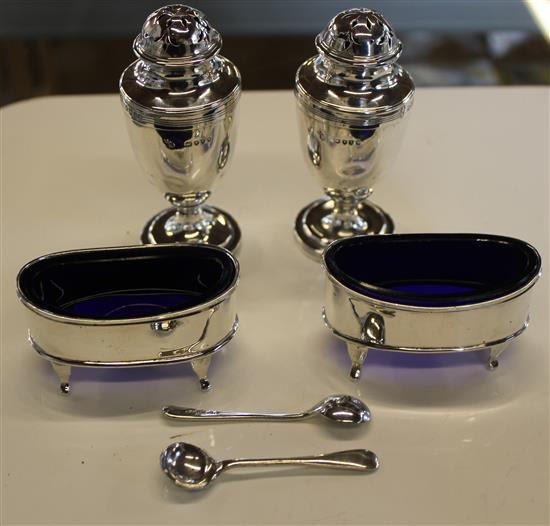 Pair of silver salts and a pair of pedestal silver pepperettes